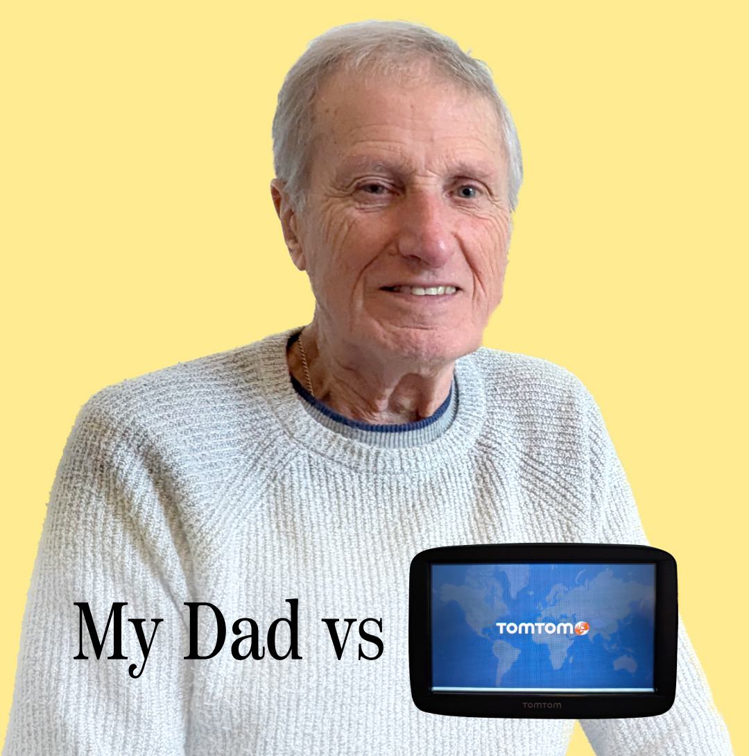 A smiling older man with grey hair wearing a grey jumper isolated on a yellow background. To the right of him are the words 'My Dad vs’ followed by an image of a TomTom sat nav device with the TomTom logo visible on the display.