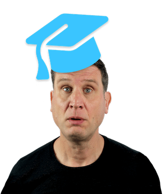 Simon (a clean shaven middle-aged white male with brown hair) wearing a black t-and a gormless look on his face. Rested awkwardly on his head a large blue icon of a flat graduation cap with a tassle.